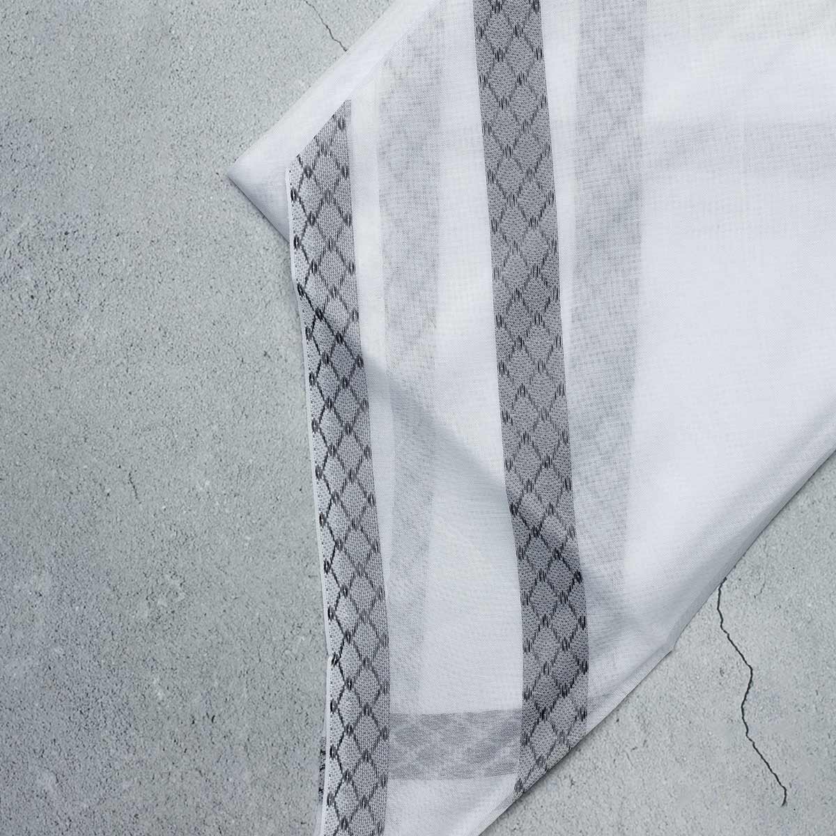 صورة شماغ أبيض صافي من الطاووس المطوّر بخامة فاخرة وثبات عالي